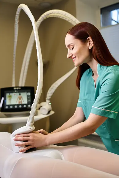 A young dermatologist carefully conducts a skin treatment in a bright, clinical setting. — Stock Photo