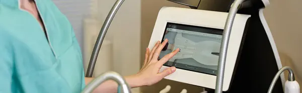 A skilled dermatologist working with contemporary tool to treat the skin. — Stock Photo