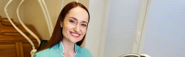 A young individual smiles as a pro prepares for procedures. — Stock Photo