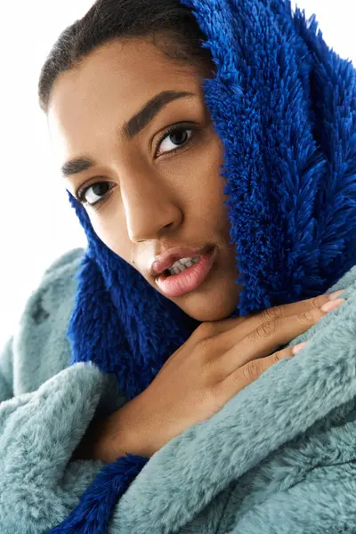 Young beautiful woman exudes charm in fashionable loungewear with vibrant textures. — Stock Photo
