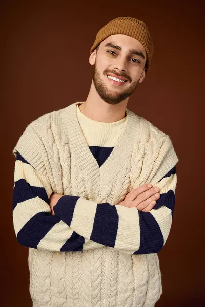 Handsome young man displays his fashion sense while posing confidently in a trendy outfit. — Stock Photo