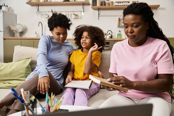 A loving family engages in creative activities together, fostering connection and joy. — Stock Photo