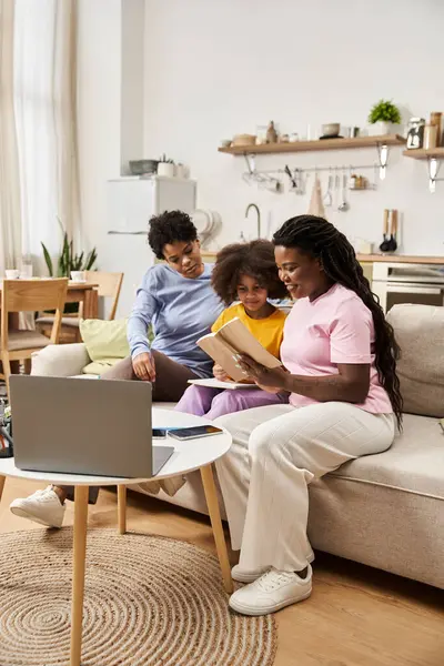 A loving family bonds over a shared activity, creating lasting memories in their home. — Stock Photo