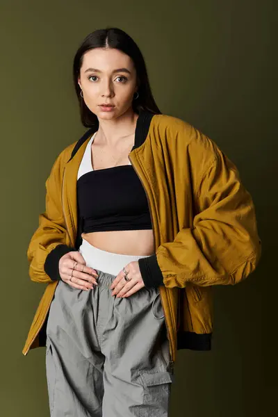 A young woman exudes confidence with her unique blend of style and comfort. — Stock Photo