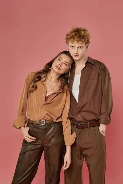Stylish couple showcases their bond through love and fashion, exuding warmth and modern elegance. — Stock Photo