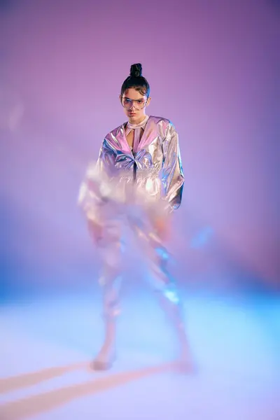 A young woman dons metallic attire, embodying a trendy look that radiates futuristic vibes. — Stock Photo