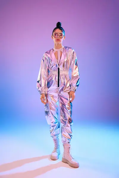 A young woman exudes confidence in a stylish, holographic outfit that embodies modern fashion. — Stock Photo