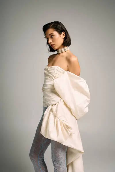 Stylish bride poses beautifully in a stunning bridal outfit, showcasing her elegance. — Stock Photo