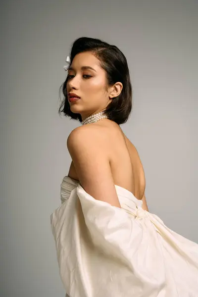 Young bride displays stunning features and elegant attire, radiating confidence and joy. — Stock Photo