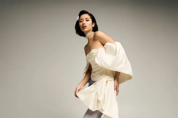 Radiant young bride captivates with her beauty, attireed in an elegant gown, exuding charm and joy — Stock Photo