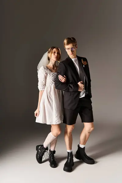 A joyful young couple showcases their love in spring attire, blending tradition with modern flair. — Stock Photo