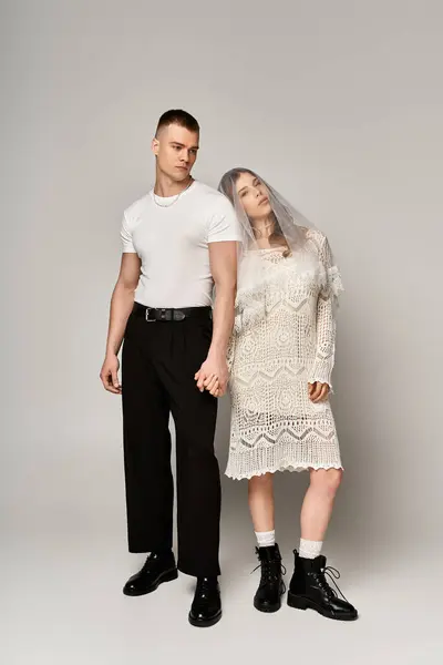 A stylish couple in wedding attire embodies elegance, romance, and love. — Stock Photo