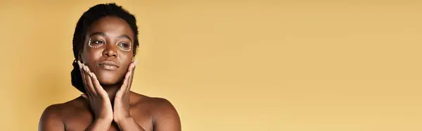Young African American woman showcases her radiant skin while embracing natural beauty, banner — Stock Photo