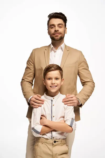A father and son share a joyful moment celebrating Father Day in a warm, festive atmosphere. — Stock Photo
