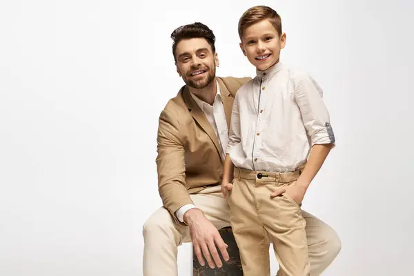 A father and son enjoy a joyful moment celebrating their bond on Fathers Day 2025. — Stock Photo