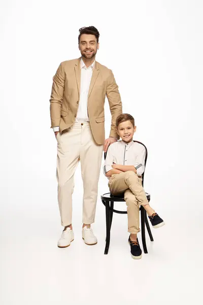 A father and his son share a moment of happiness, celebrating their bond on Father Day together. — Stock Photo