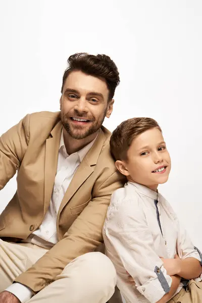A father and son share a joyful celebration together, showing love and connection on Father Day. — Stock Photo