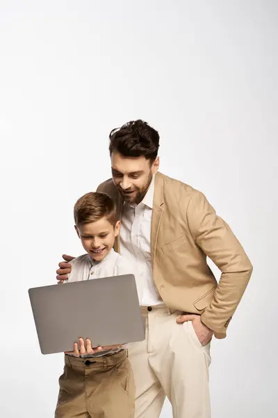 A father and son enjoy quality time together while celebrating Father Day with love and excitement. — Stock Photo