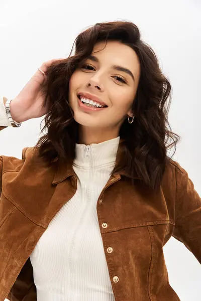 A young woman models trendy cow print pants paired with a stylish top, exuding confidence. — Stock Photo