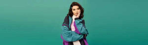 A young woman poses thoughtfully in trendy sportswear, radiating style and confidence, banner — Stock Photo