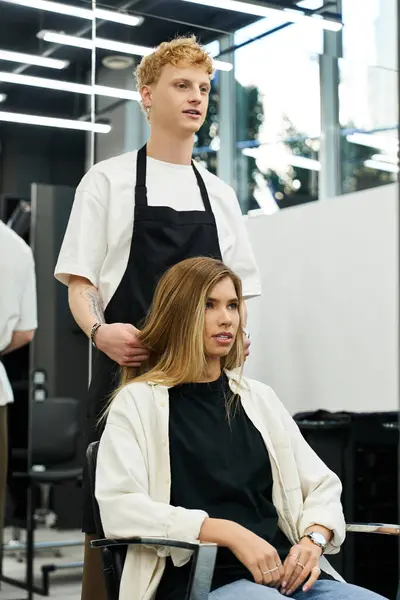 Stylists engage in creative hair transformations while clients enjoy the trendy ambiance. — Stock Photo