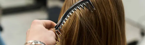 Stylists expertly work on hair transformation, showcasing trendy styles and techniques for clients. — Stock Photo