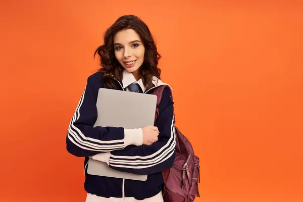 Stylish woman embraces her modern look with a skirt and jacket, radiating youthful energy. — Stock Photo