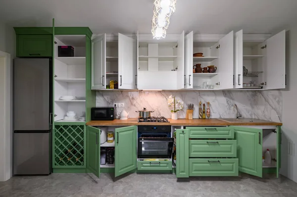 Doors Open Drawers Pulled Out New Green White Kitchen Furniture — Stock fotografie
