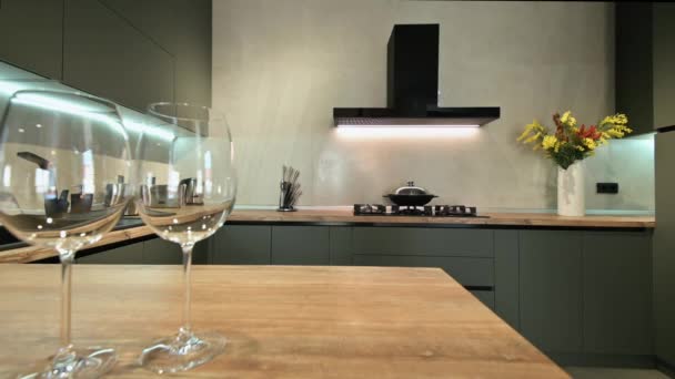 Modern Luxurious Dark Gray Black Kitchen Closeup Two Empty Wineglasses — Wideo stockowe