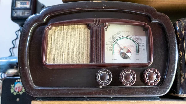Old Vintage Radio Receiver. Antique Old Brown Radio  Soviet Receiver Worldwide Transmission Over Short Wave From the Last Century