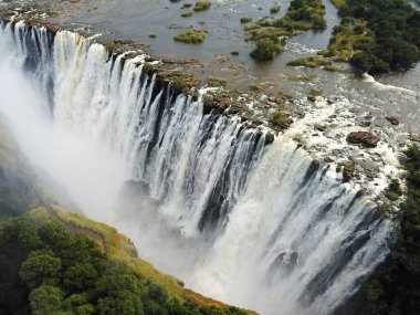 Victoria Falls at the Border of Zimbabwe and Zambia in Africa. The Great Victoria Falls One of the Most Beautiful Wonders of the World. Unesco World Heritage. Aerial Shot From Above.
