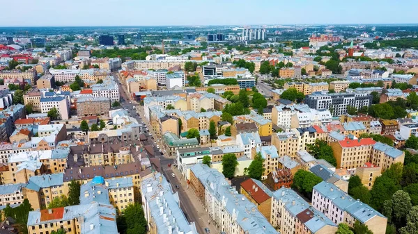 stock image Riga Cityscape Spring Aerial Top View Video, Town, Latvia. Sunny Day Building Rooftops. Riga Skyline, Latvia, City Center, Teika, Purvciems in the Background. Architecture of the Downtown.