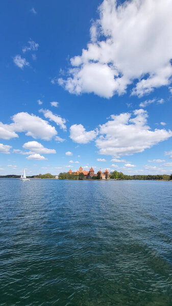 Trakai Medieval Gothic Island Castle, Located in Galve Lake. Aerial Shot of the Most Beautiful Lithuanian Landmark. Trakai Island Castle - One of the Most Popular Tourist Destination in Lithuania