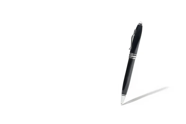 Detaillierte Schwarze Klassische Kugelschreiber Schreiben Auf Weißer Oberfläche Mit Seinem — Stockfoto
