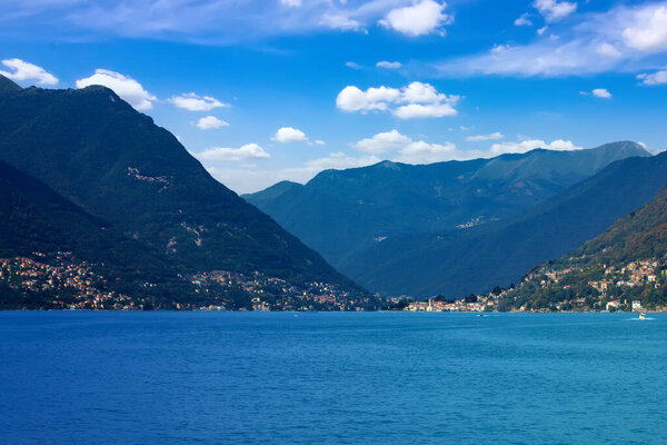 View of the beautiful architecture and Lake Como in Italian Alps