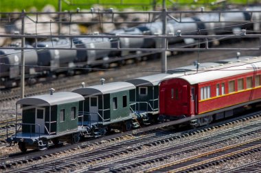 View of the train station and train with wagon - miniature clipart