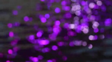 Sudaki odaklanmış parlaklıktan alınan arkaplan videosu.