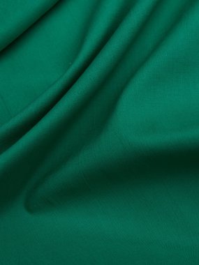 Arka plan - yeni yeşil keten kumaş. Pahalı kumaşın yüksek kaliteli dokusu.