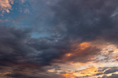 Cloudscape at sunrise. Sky view in the morning with dramatic clouds. Nature background photo. clipart