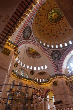 Domes of Suleymaniye Mosque. Islamic vertical background photo. Ottoman architecture. Istanbul Turkiye - 10.27.2022
