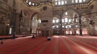 Suleymaniye Mosque in Istanbul. Interior of Suleymaniye Mosque. Ottoman architecture. Islamic background 4k video. Istanbul Turkiye - 27.10.2022
