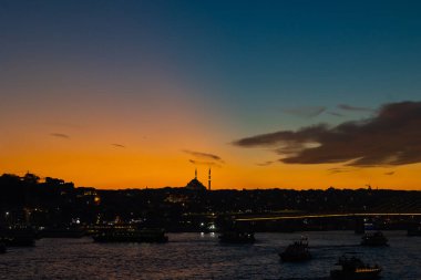 Istanbul view at sunset. Fatih Mosque and Golden Horn. Islamic or ramadan concept.