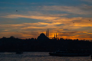 Istanbul silhouette background. Silhouette of Suleymaniye Mosque at sunset. Ramadan or islamic background photo.