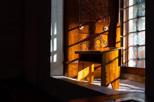 Islamic photo. A wooden lectern or rahle in the mosque. Ramadan or islamic or kandil or laylat al-qadr concept photo.