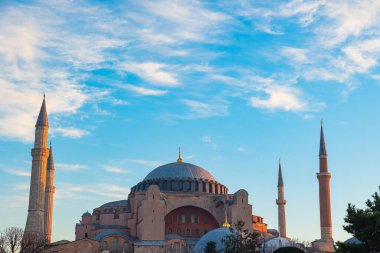 Hagia Sophia or Ayasofya Mosque at sunrise with partly cloudy sky. Ramadan or islamic background photo. Travel to Istanbul concept photo.