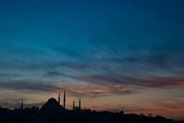Ramadan or islamic concept photo. Silhouette of Suleymaniye Mosque at sunset. Travel to Istanbul background photo.
