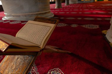 Islamic background photo. The Holy Quran in the mosque. Ramadan or laylat al-qadr or kadir gecesi concept photo. Istanbul Turkiye - 1.18.2023