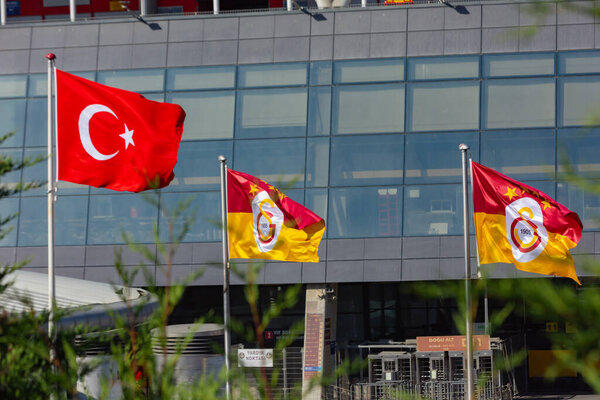 Galatasaray and Turkish Flags on the flagpole. Istanbul Turkiye - 10.28.2023