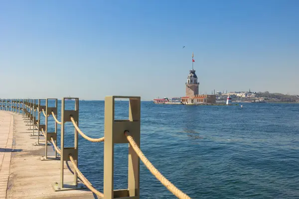 stock image Kiz Kulesi aka Maiden's Tower with newly constructed Salacak coastline. Visit Istanbul concept photo.