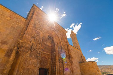 Great Mosque of Divrigi aka Divrigi Ulucamii with sun. Sivas Turkey - 6.26.2024 clipart